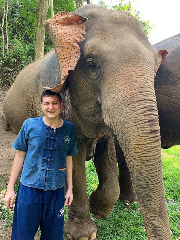 Caleb Moon with elephant.