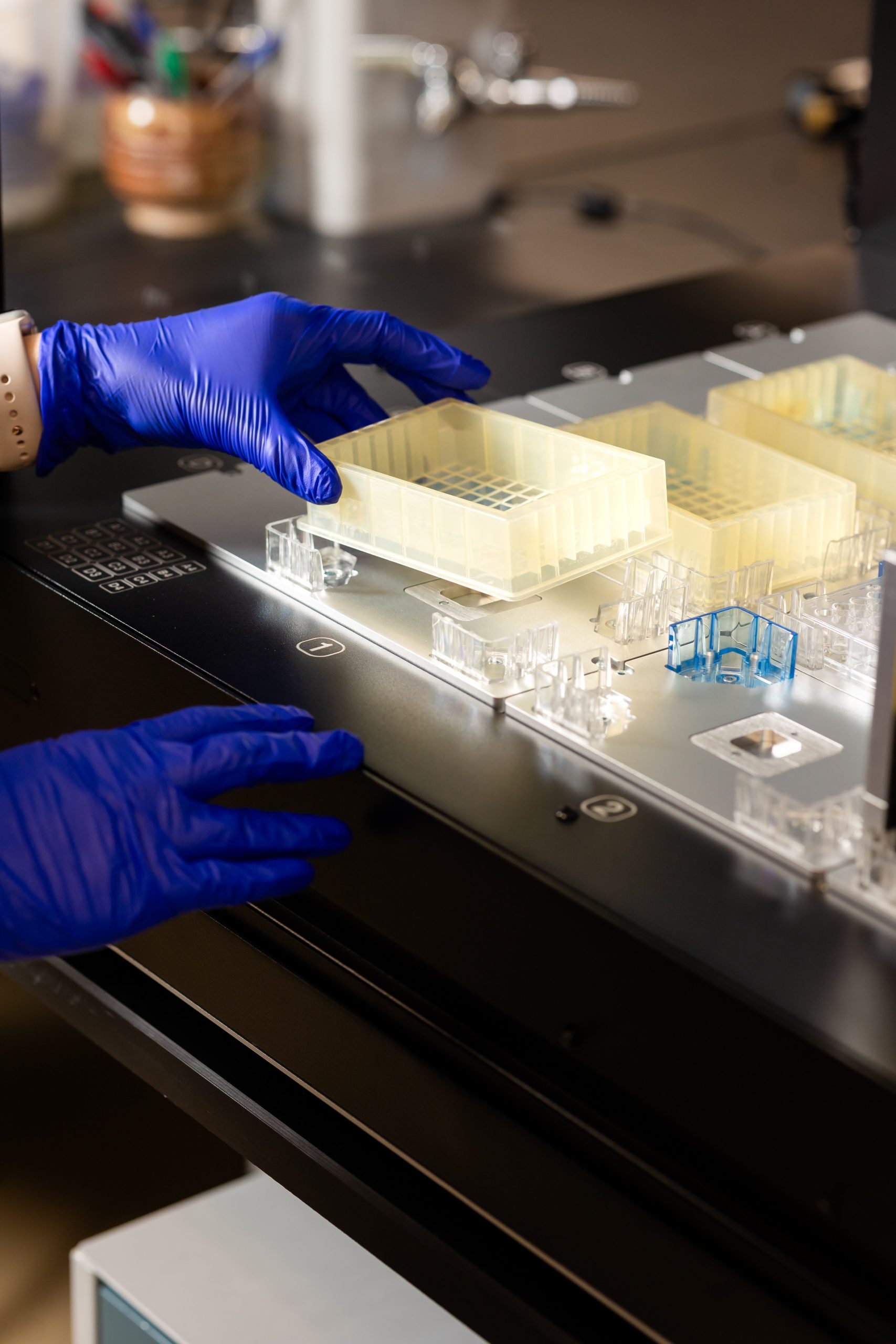 Hannah Boyd using equipment in the lab