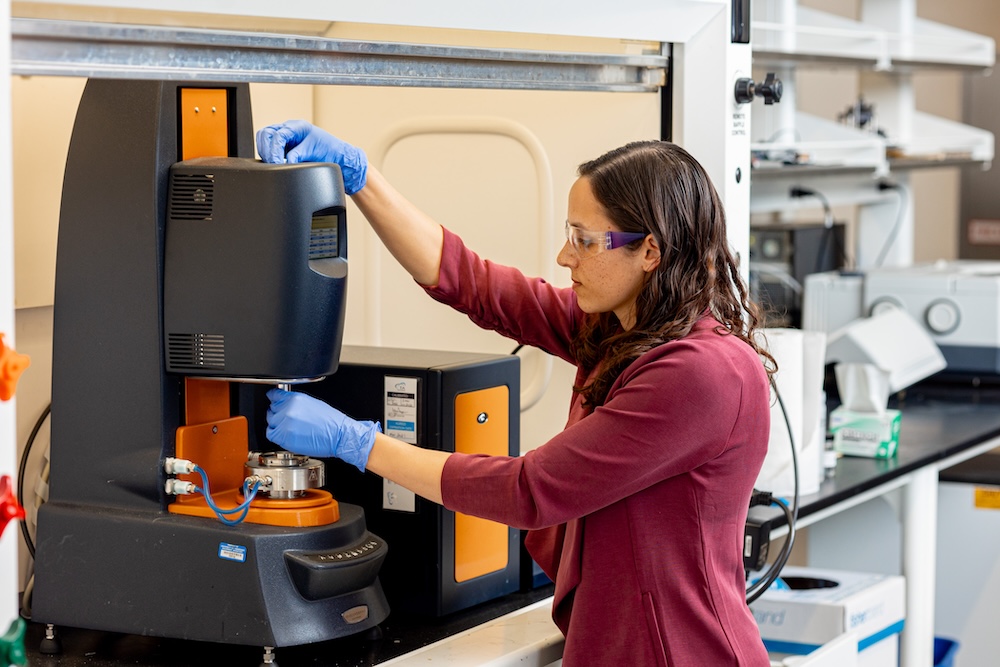 Ria Corder working with polymers in her lab