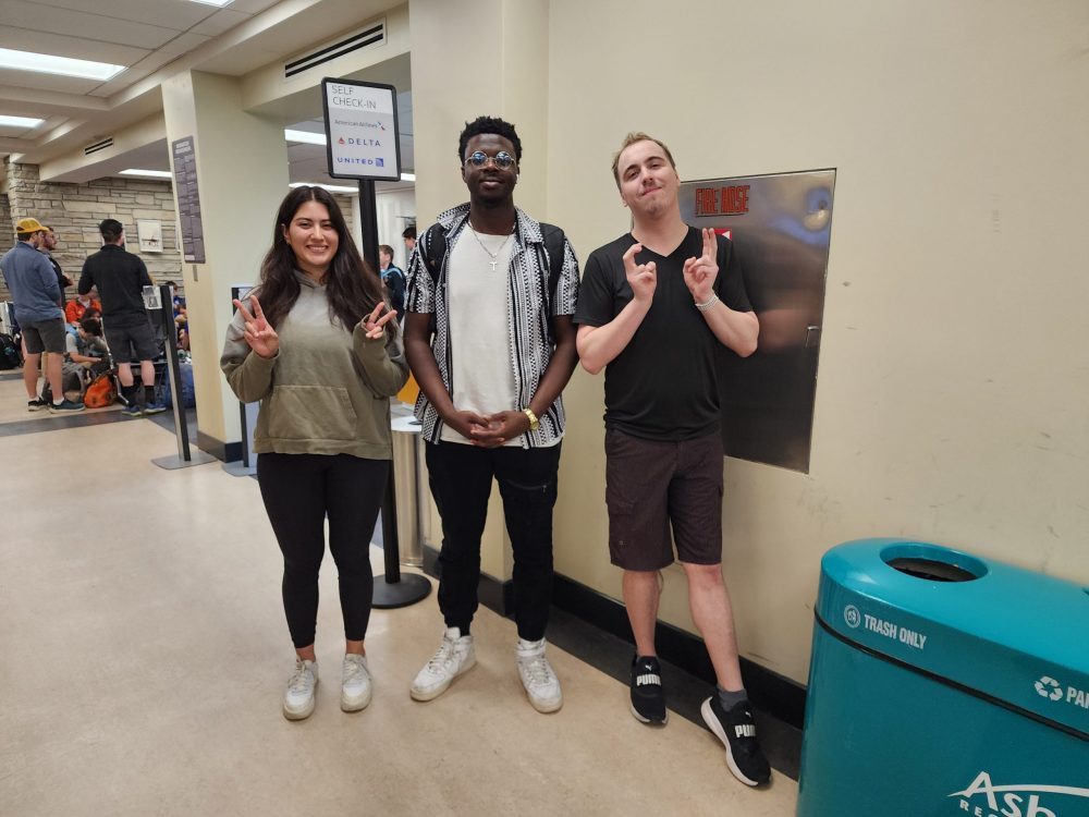 Left to right: Victoria Rapalo, Semilore Abiodun-Adeniyi, and Bryce Bible in the airport heading to Japan