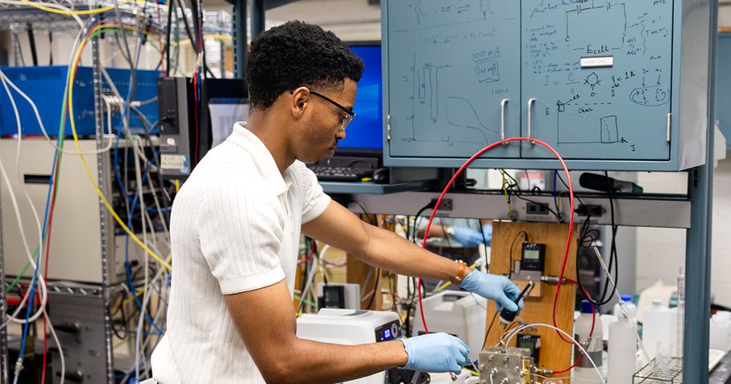 Brian Washington working on lithium batteries for his startup Aluminairy in a lab