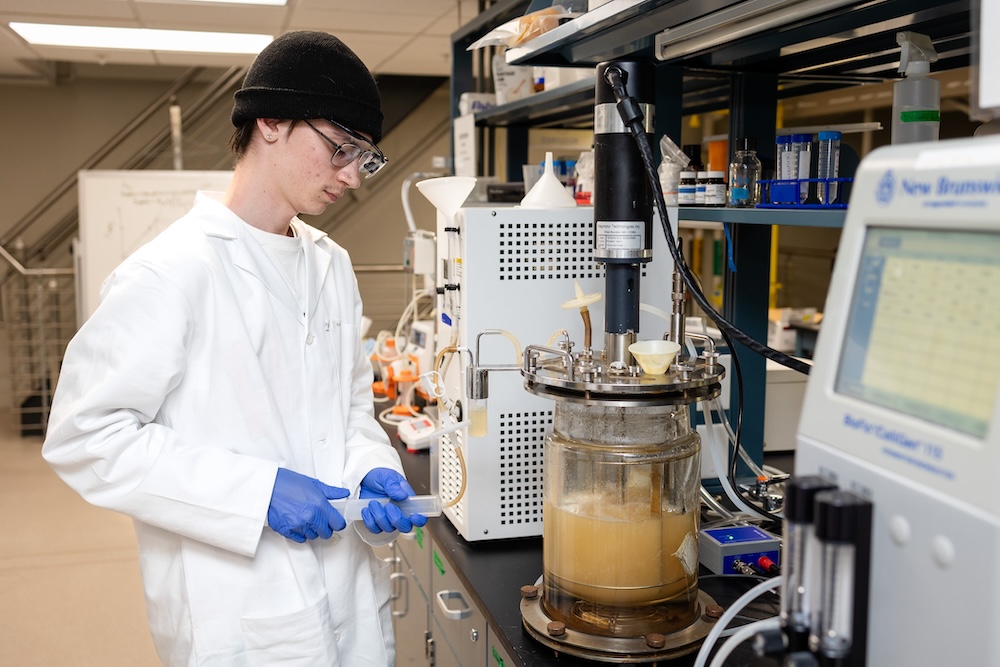 student running experiments in Eastman lab