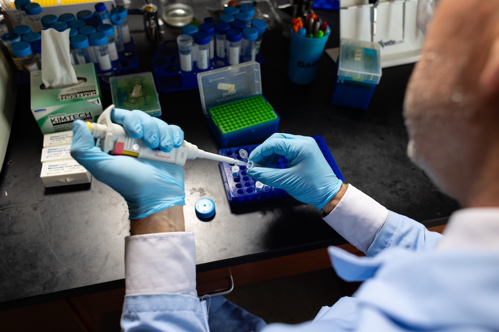 Paul Dalhaimer injecting something into a tube