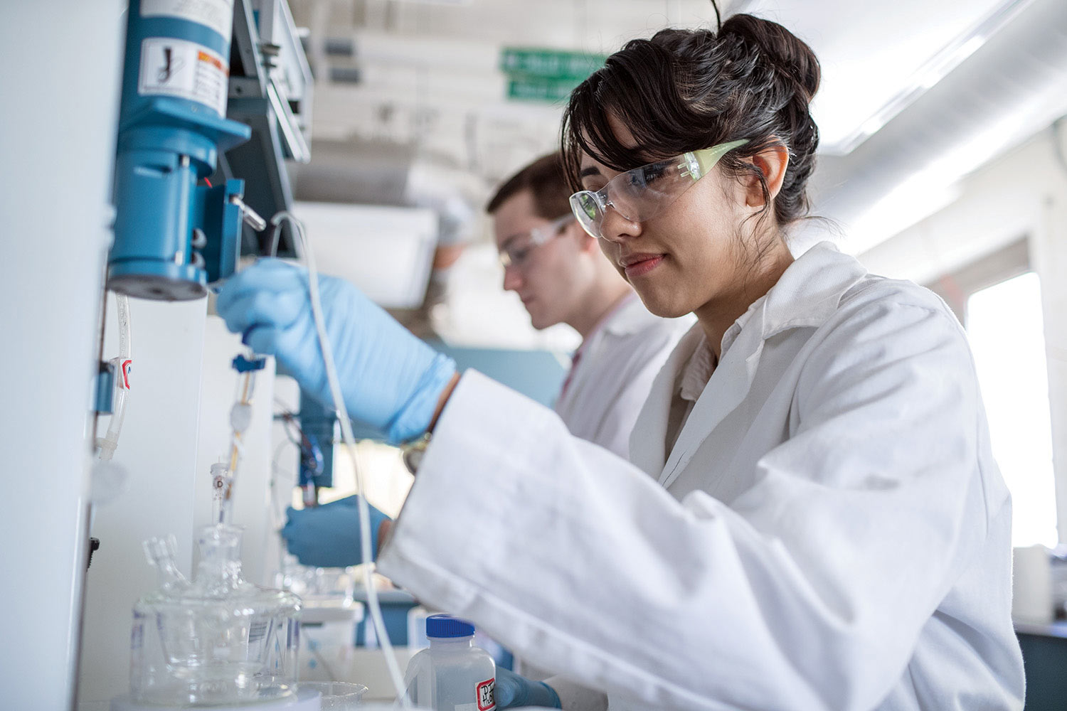 Two students working in a CBE lab.